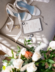 Wedding detail shot of invite, bouquet and shoes at SkyView Golf Club in New Jersey.