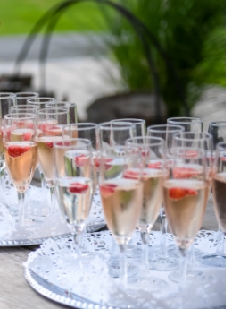 Glasses of pink champagne on trays for event at SkyView Golf Club in New Jersey.